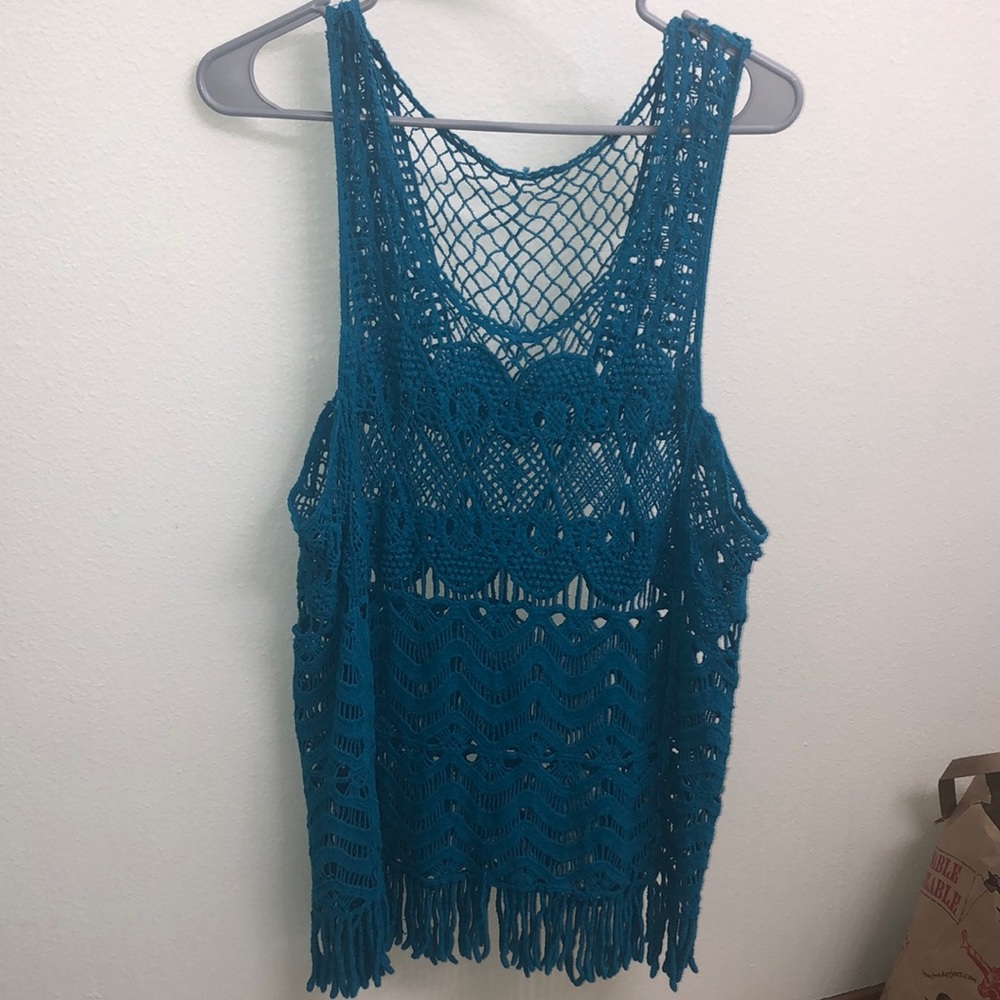 Blue knitted swim, cover, over